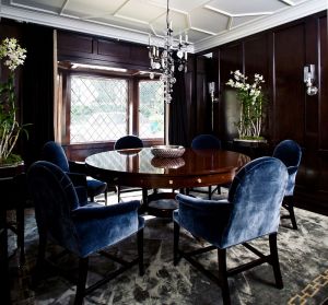 Windsor Smith decorated gorgeous paneled dining room with a white ceiling.jpg